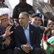 US President Barack Obama (C) talks with Chairman of the Standing Rock Soiux Tribal Nation David Archambault II (L) during the Cannon Ball Flag Day Celebration in Cannon Ball, North Dakota, June 13, 2014.